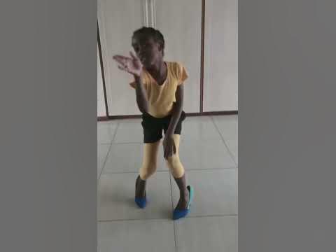 Trying on mommy's shoes😅